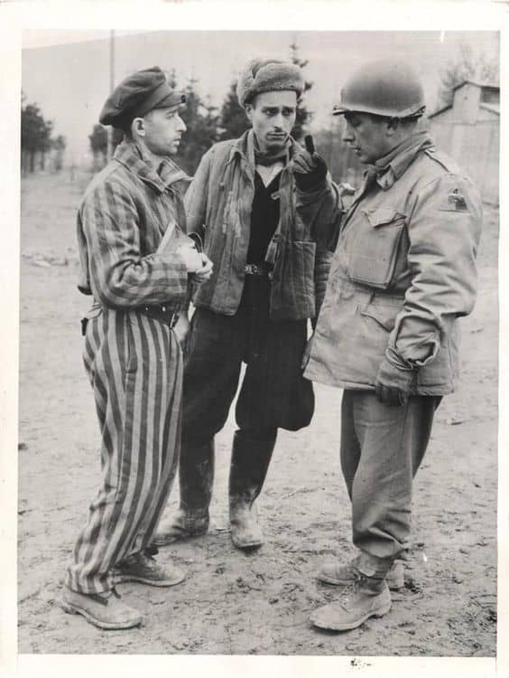 Major John R. Scotti talking to survivors Ohrdruf